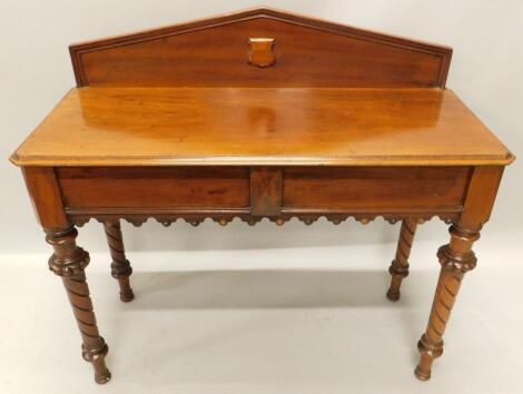 A Victorian mahogany side table