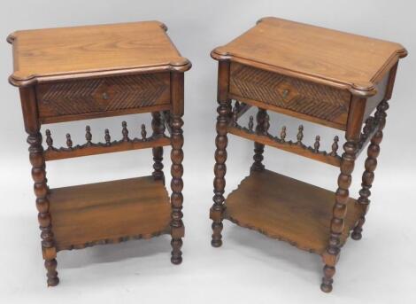 A pair of oak Arts and Crafts style bedside cabinets