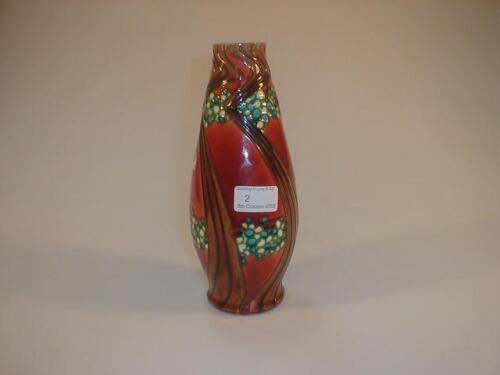 A Mintons pottery Secessionist vase of slender baluster form