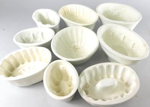 A collection of late 19th/early 20thC cream glazed kitchen moulds