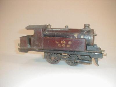 An O gauge 0-4-0 tin plate steam engine