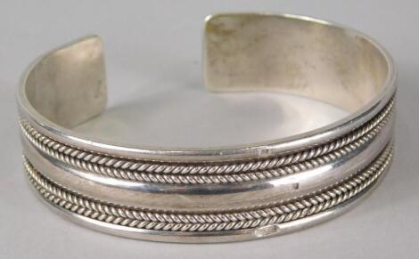 An Egyptian silver bangle