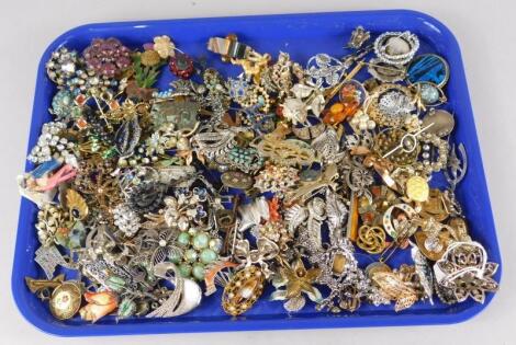 A collection of brooches