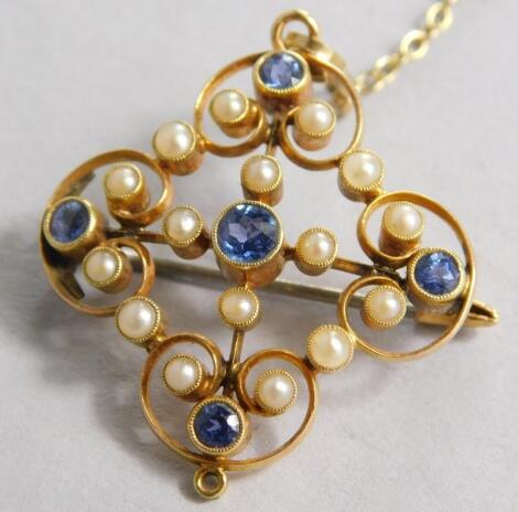 A 15ct gold sapphire and seed pearl set bar brooch