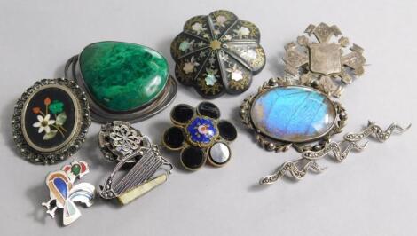 Ten brooches