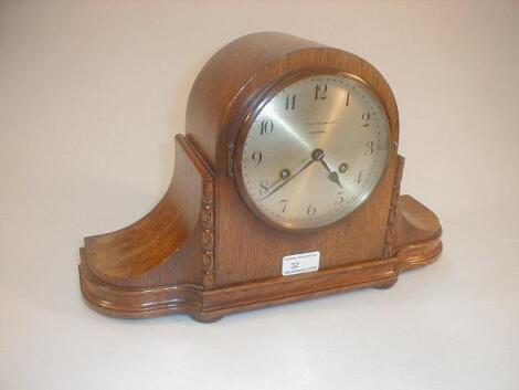 An early 20thC oak cased mantel clock