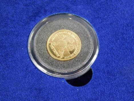 A gold Piedfort Tristan 250th Anniversary of Lord Nelson crown coin