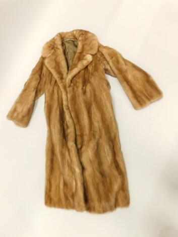 A full length ladies' fur coat