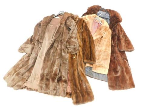 Three fur coats