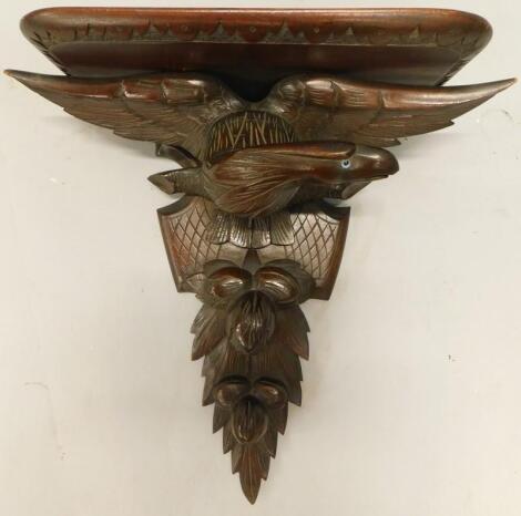 A Victorian mahogany wall bracket