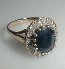 An Australian sapphire and diamond cluster ring set in 9ct gold