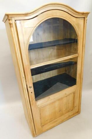 A Continental pine display cabinet