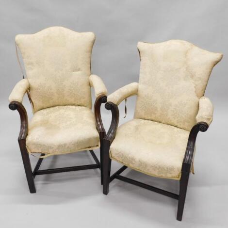 A pair of mahogany Gainsborough type chairs in George III style