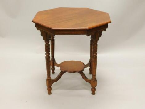 An Edwardian mahogany window table