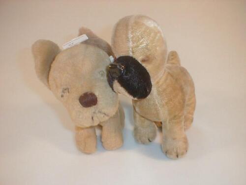 A Merrythought plush dog 7" high