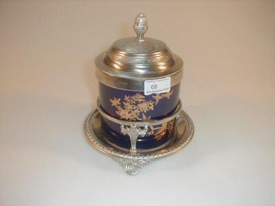 A Limoges porcelain biscuit barrel with plated mounts and stand
