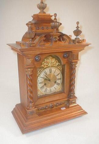 An early 20thC German walnut bracket clock of fourteen-day striking movement