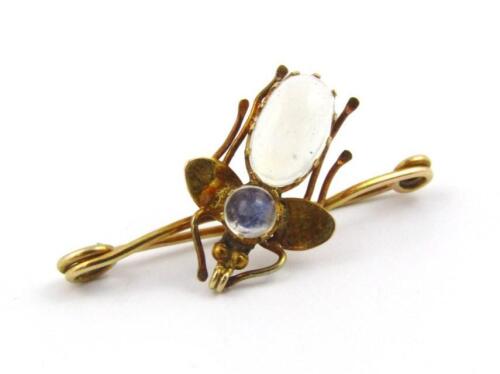 A fly bar brooch