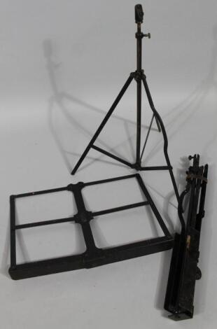 Three various metal extending musical tripods or stands