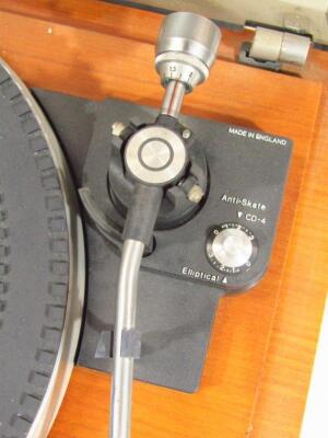 A mid 20thC Garrard Direct Drive DD75 turn table - 3