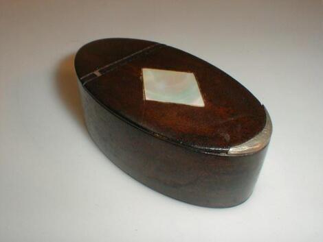 A Georgian oval leather snuff box