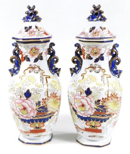 A pair of 19thC Masons octagonal vases and covers