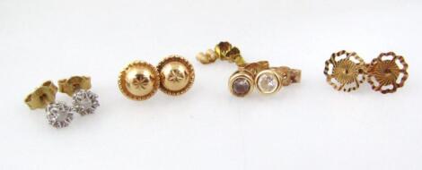 Four pairs of gold earrings