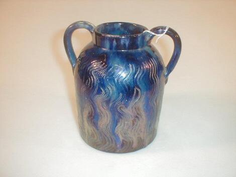 A stoneware two handled vase