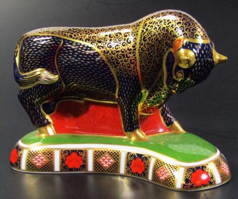 A Royal Crown Derby paperweight figure