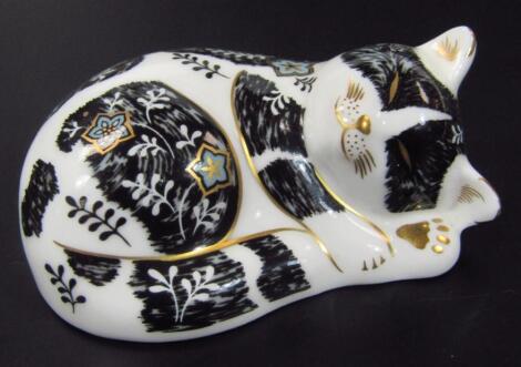 A Royal Crown Derby paperweight figure