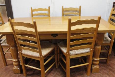 A 20thC light oak refectory table