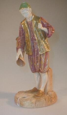 A Royal Worcester Cairo ware figure of a male water carrier