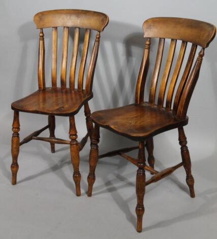 A pair of 19thC ash and elm kitchen chairs