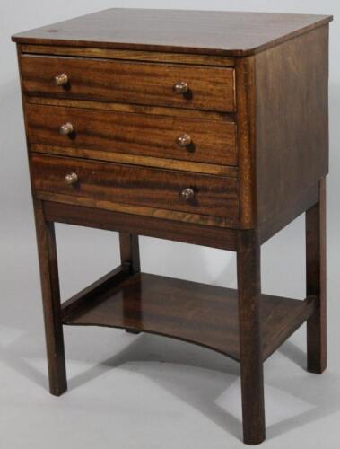 A 20thC mahogany finish pedestal cabinet