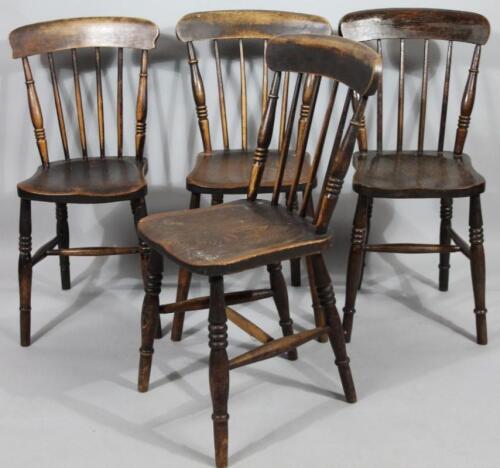 A set of four very late 19thC ash and elm kitchen chairs