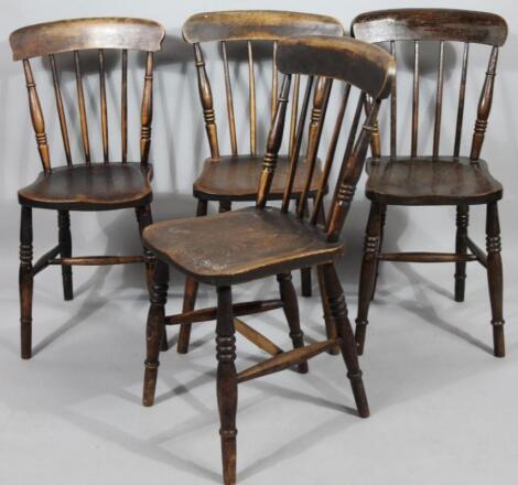 A set of four very late 19thC ash and elm kitchen chairs