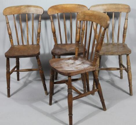 A Harlequin set of four very early 20thC ash and elm kitchen chairs