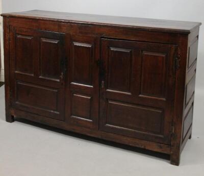 An 18thC oak side cabinet