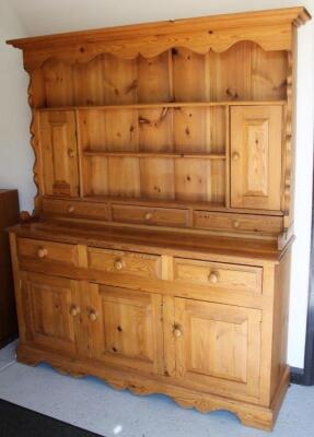 A 20thC stripped and lightly polished pine dresser