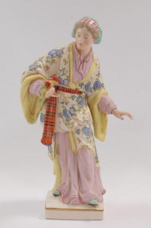 A Continental 20thC porcelain figure of a lady