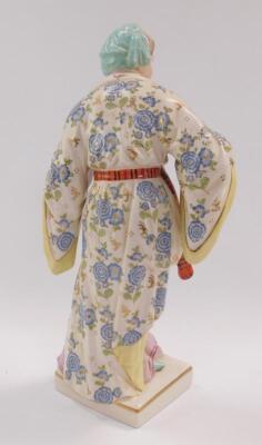 A Continental 20thC porcelain figure of a lady - 3