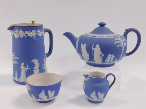 A Wedgwood late 19thC dark blue Jasperware four piece tea set