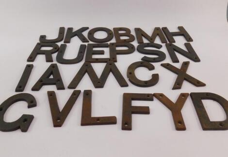 Twenty three cast iron letters from the alphabet