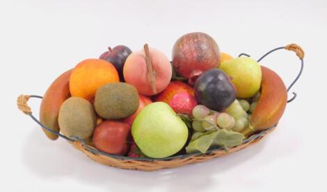 An Italian late 20thC retro basket of plastic fruits