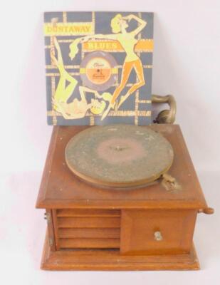 An HMV oak cased table top gramophone