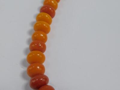 A butterscotch amber necklace - 4