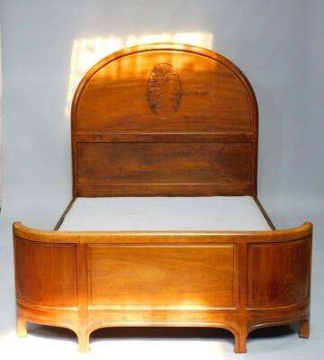 A French Art Nouveau walnut double bed