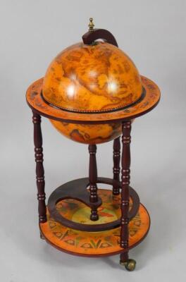 A retro terrestrial globe drinks cabinet