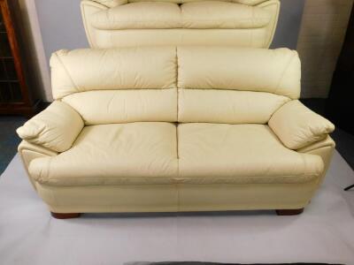 A cream leather three seater sofa and a two seater sofa - 3