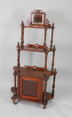 A Victorian stained pine four tier whatnot